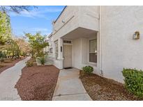 Inviting exterior with walkway leading to the entrance of the home at 5201 S Torrey Pines Dr # 1172, Las Vegas, NV 89118