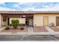 Inviting exterior of a single-story home with landscaping and a walkway at 3017 Saint George St # B, North Las Vegas, NV 89030