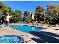 Inviting community pool and spa area, perfect for relaxation and recreation at 730 S Royal Crest Cir # 445, Las Vegas, NV 89169