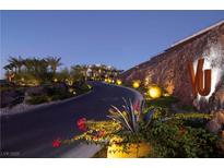 Luxurious community entrance with attractive landscaping and modern design at 371 Tranquil Peak Ct, Henderson, NV 89012