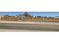 Charming home featuring a rustic fence for privacy at 919 Havre Ave, Henderson, NV 89015