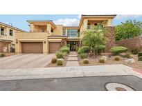 Two-story luxury home with stone accents and attached two-car garage at 101 San Martino Pl, Henderson, NV 89011