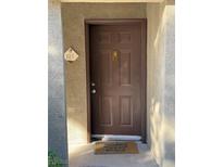 Inviting condo entry with brown door and welcoming mat at 9000 Las Vegas Blvd # 1013, Las Vegas, NV 89123