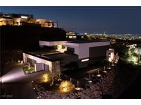Stunning modern home with city views, private driveway and professional landscaping at 609 Sleeping Dragon Dr, Henderson, NV 89012