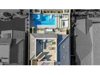 Stunning aerial view showcasing a backyard oasis with pool and rooftop patio at 483 Astillero St, Las Vegas, NV 89138