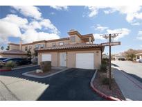 Attractive two-story townhome with attached garage and landscaped grounds at 6701 Dorita Ave # 201, Las Vegas, NV 89108