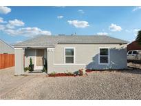 Charming bungalow with freshly painted exterior and landscaping at 630 Biltmore Dr, Las Vegas, NV 89101