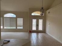 Bright entryway with tile floors and double doors at 10973 Inverlochy Ct, Las Vegas, NV 89141