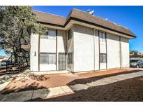 Two story building exterior with parking and landscaping at 4348 Tara Ave # 2, Las Vegas, NV 89102