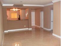 Bright living room with tile floors and neutral walls at 270 E Flamingo Rd # 211, Las Vegas, NV 89169