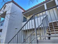 Exterior view of a two-story building with stairs and railings at 3318 N Decatur Blvd # 2068, Las Vegas, NV 89130