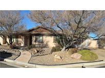 Single-story house with landscaped yard and gated driveway at 4440 E Boston Ave, Las Vegas, NV 89104
