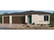 Single-story house with three-car garage and desert landscaping at 4380 E Brusca Way, Pahrump, NV 89061