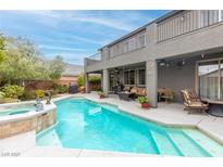 Inviting backyard pool and spa with patio at 7306 Puckershire St, Las Vegas, NV 89166