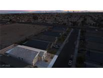 Aerial view of a house and neighborhood, showcasing the property's location and surroundings at 3540 Valley Lily St, North Las Vegas, NV 89032