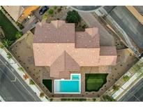 Luxury home with pool and putting green, as seen from above at 4807 Enchanted View St, Las Vegas, NV 89149