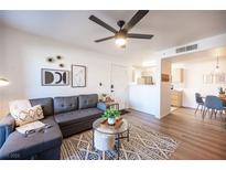 Spacious living room with sectional sofa and modern decor at 950 Seven Hills Dr # 2017, Henderson, NV 89052