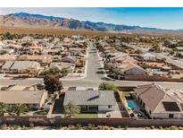 Aerial view showing a single-Gathering home with pool and desert landscape at 1960 S Vineyard Dr, Pahrump, NV 89048