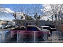 Ranch style home with mature trees and a fenced yard at 1509 Ardmore St, Las Vegas, NV 89104