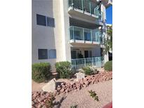 Exterior view of a two-story building with balconies and landscaping at 3550 Bay Sands Dr # 2048, Laughlin, NV 89029