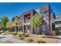 Modern two-story townhome with landscaped grounds at 1254 Venue St # 102, Las Vegas, NV 89135