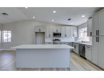 Modern kitchen with stainless steel appliances and an island at 1850 Banaba Ln, Las Vegas, NV 89156