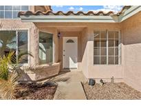 Inviting front entrance with a white door and large windows at 3139 Ocotillo Dr, Laughlin, NV 89029