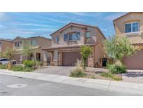 Two-story home with attached garage and landscaped front yard at 4138 Bayley Skye Ave, Las Vegas, NV 89141