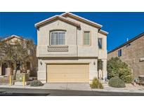 Two-story house with attached garage and landscaping at 9462 Diamond Bridge Ave, Las Vegas, NV 89166