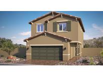 Two-story house with tan siding, green garage door, and landscaping at 9998 Ullom Dr # 16, Las Vegas, NV 89141