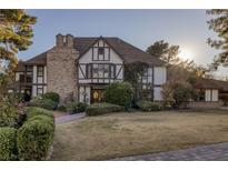 Inviting Tudor-style home with manicured landscaping and brick accents at 3141 E Katie Ave, Las Vegas, NV 89121