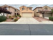 Two-story house with attached garage and landscaping at 7632 Highland Pony St, Las Vegas, NV 89149