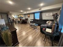 Spacious living room featuring hardwood floors and comfortable seating at 1414 N Jones Blvd, Las Vegas, NV 89108