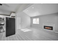 Bright living room with fireplace and laminate flooring at 1701 E Katie Ave # 32, Las Vegas, NV 89119