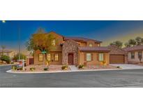 Two-story house with stone accents and landscaped yard at 2755 Asgard Ave, Las Vegas, NV 89121