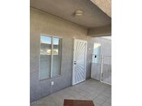 Inviting entryway with tiled flooring and a security door at 1726 N Jones Blvd, Las Vegas, NV 89108