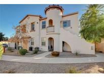 Exterior of a charming two-story townhome with a unique architectural design at 50 Aura De Blanco St # 17204, Henderson, NV 89074