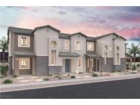 New three-unit townhome development with modern finishes and desert landscaping at 852 Angwin Ln, Henderson, NV 89011