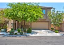 Two-story house with attached garage and landscaping at 7906 Woolly St, Las Vegas, NV 89149