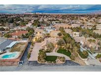 Luxury home with circular driveway, pool, and stunning views at 358 E Torino Ave, Las Vegas, NV 89123