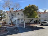 Charming apartment featuring a covered parking area and well-maintained landscaping at 4316 W Lake Mead Blvd # 102, Las Vegas, NV 89108