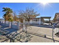 Updated single story home with new paint and landscaping at 1605 Oakwood Ave, North Las Vegas, NV 89030