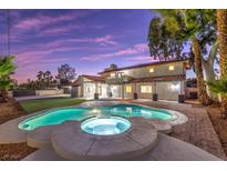 Luxury home with inviting pool and spa, perfect for relaxation at 5750 Edna Ave, Las Vegas, NV 89146