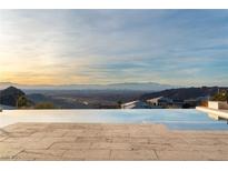 Luxury infinity pool overlooking city and mountain views at 49 Vista Outlook St, Henderson, NV 89011