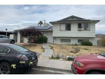 Ranch style home with solar panels and landscaped yard at 6324 Fairwood Ave, Las Vegas, NV 89107