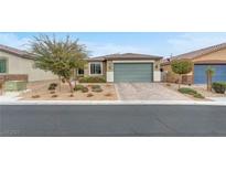 Charming single-story home with a two-car garage and desert landscaping for low maintenance at 5640 Akula Bay St, North Las Vegas, NV 89081