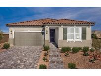 One-story home with tile roof, attached garage, and landscaped front yard at 732 Icy Fjord Ln, Henderson, NV 89015