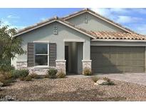 One-story home with stone accents and a two-car garage at 9195 Oakdale Ranch Ct, Las Vegas, NV 89139