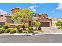 Two-story house with stone accents and a landscaped front yard at 12617 New Providence St, Las Vegas, NV 89141