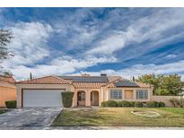 Single-story home with solar panels and landscaped yard at 501 Hidden Ct, Las Vegas, NV 89145